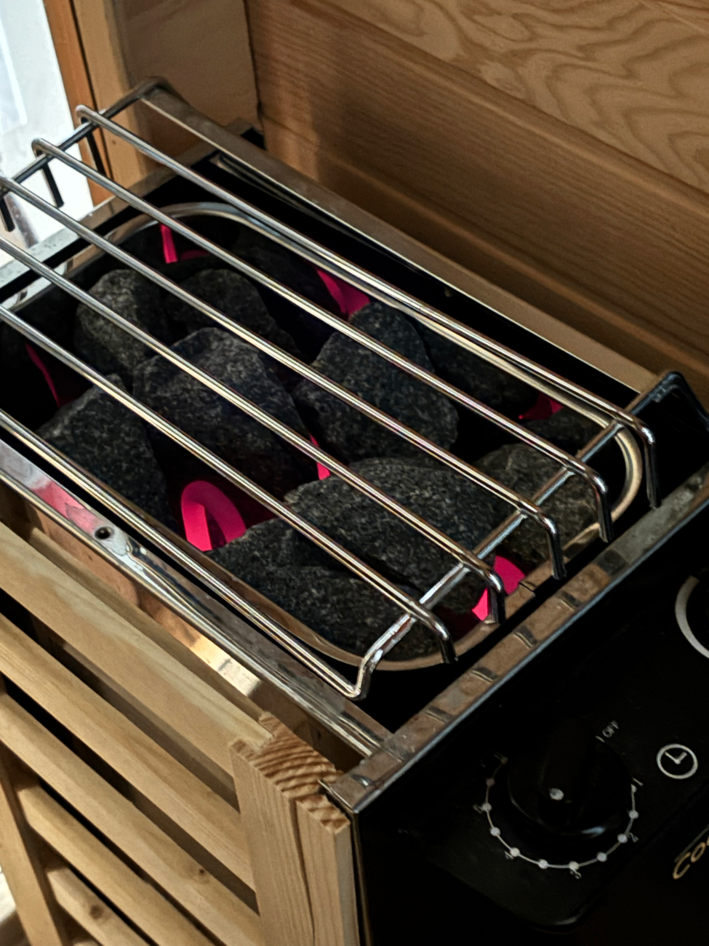 Sauna heater with stones